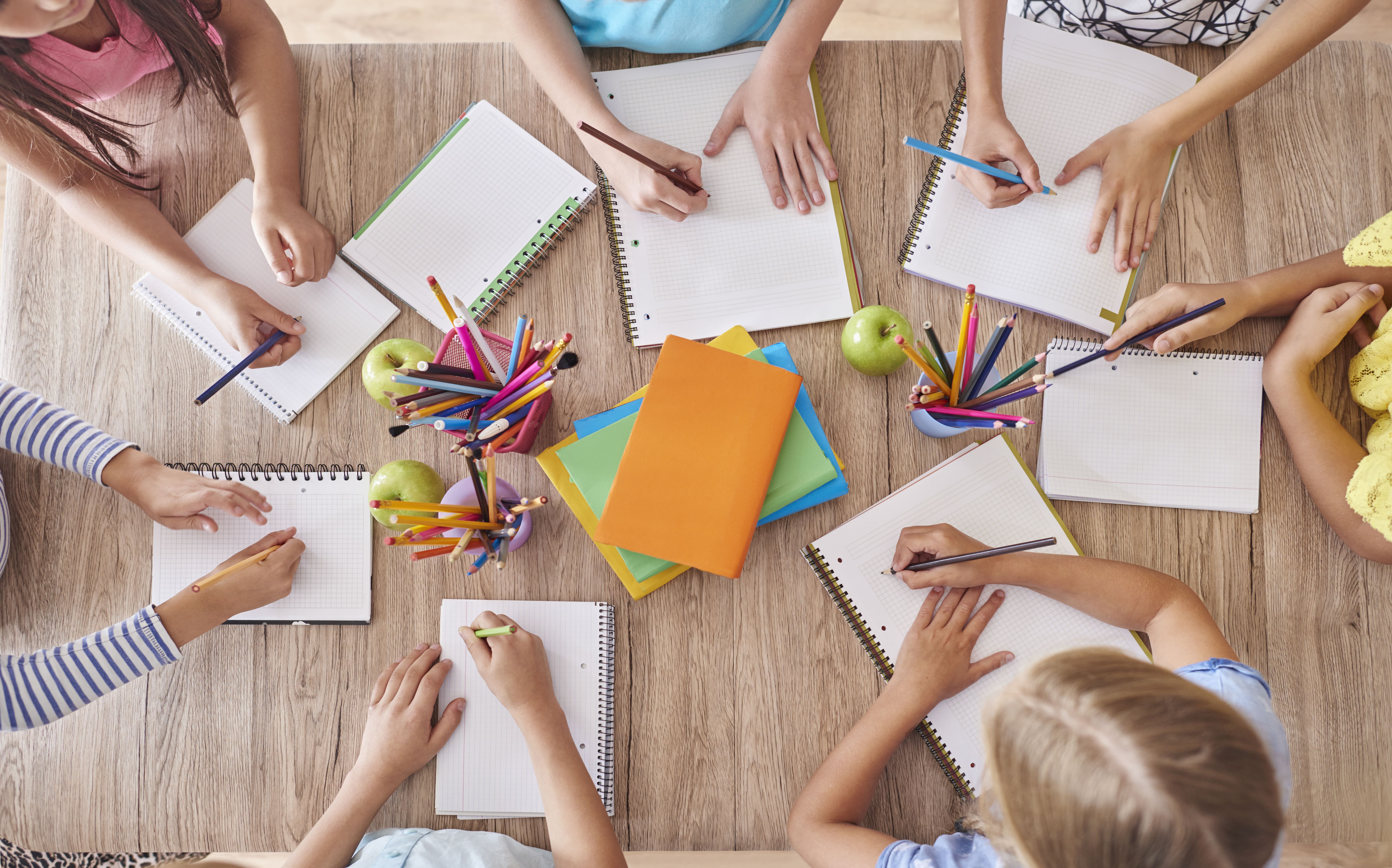 Kids around school table